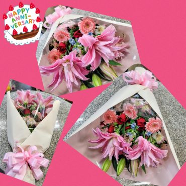 ピンクユリの入った花束